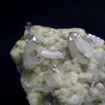 Скипетровидные кристаллы Аметиста на породе