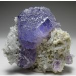 Фиолетовые кристаллы Флюорита на Кварце