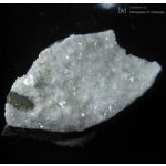 Жисмондин - кристаллы на мелких кристаллах филлипсита.